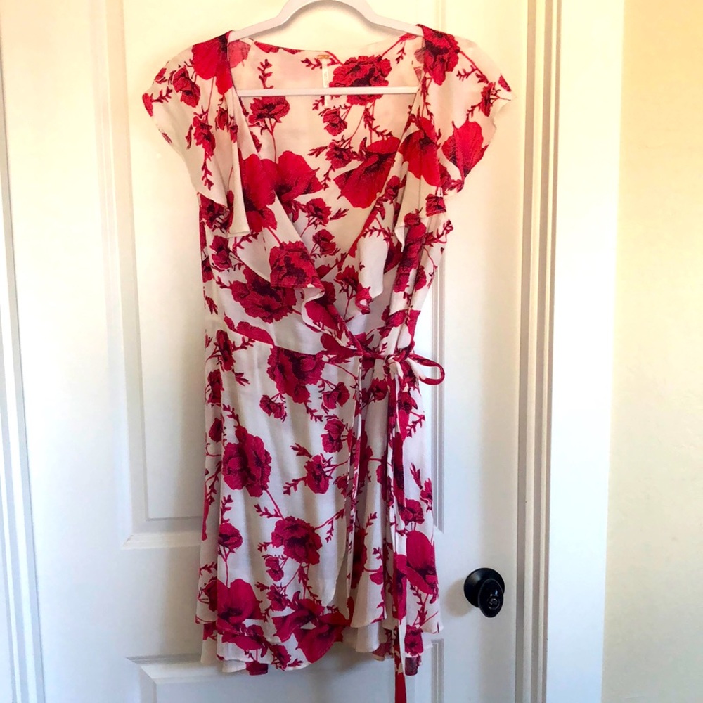 Free People wrap dress. Beautiful dark pink hibiscus design. Size large